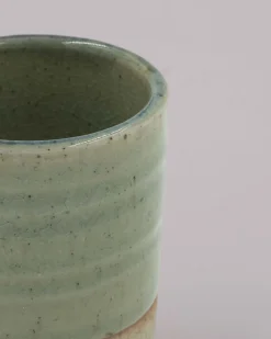 Grøn cylinderformet kop