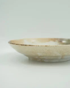 Mellemstort beige fad